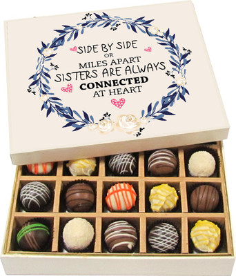 

Chocholik Rakhi Gift Box - Sisters Are Always Connected by Heart - Dark, Milk, White Chocolate Truffles - 20pc Truffles(300 g)