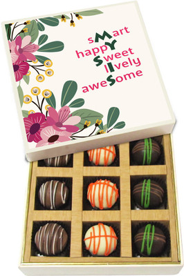

Chocholik Rakhi Gift Box - Smarty Happy Sweet Lovely Awesome - Dark, Milk, White Chocolate Truffles - 9pc Truffles(135 g)