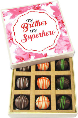 

Chocholik Rakhi Gift Box - My Brother My Superhero - Dark, Milk, White Chocolate Truffles - 9pc Truffles(135 g)