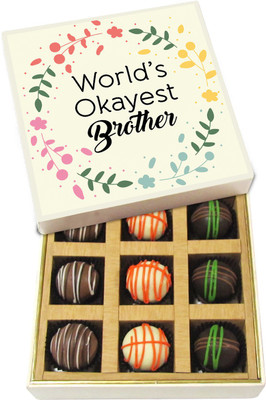 

Chocholik Rakhi Gift Box - Worlds Okayest Brother - Dark, Milk, White Chocolate Truffles - 9pc Truffles(135 g)