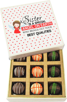 

Chocholik Rakshabandhan Gift Box - A Sister Is a Special Angel on Earth Who Brings - Dark, Milk, White Chocolate Truffles - 9pc Truffles(135 g)