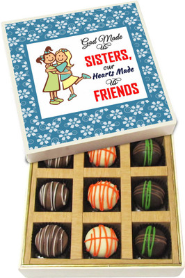 

Chocholik Rakhi Gift Box - God Made Us Sisters Our Hearts Made Us Friends - Dark, Milk, White Chocolate Truffles - 9pc Truffles(135 g)