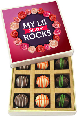 

Chocholik Rakshabandhan Gift Box - My Lil Sis Rocks - Dark, Milk, White Chocolate Truffles - 9pc Truffles(135 g)