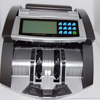 

Truster SEMIVALUE Ease 1000 Note counting Machine with LCD Display Cash Counting Machine with Fake Note Detector UV & MG Cash Bank Note Counting Machine (Counting Speed - 1000 notes/min) Note Counting Machine(Counting Speed - 1000 notes/min)