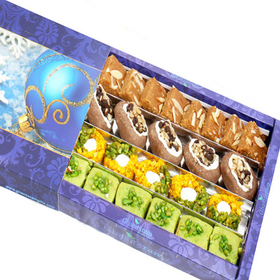 

Ghasitaram Gifts Assorted Box of Pista Barfi, Kesar Pista Delight, Choco Boat and Besan Barfi(800 g, Box)