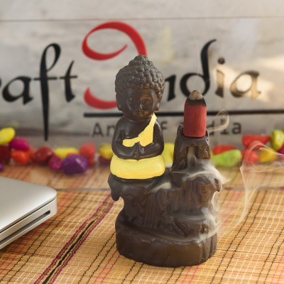 eCraftIndia Meditating Monk Buddha Smoke 30 Backflow Cone Decorative Incense Holder (7 cm x 7 cm x 12, Yellow) Decorative Showpiece  -  12 cm(Polyresin, Yellow, Brown)
