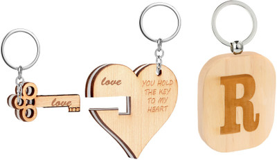 

Flipkart SmartBuy Trending Wooden Finish Combo of Heart & Key Shape key Chain and Alphabet -R Key Chain