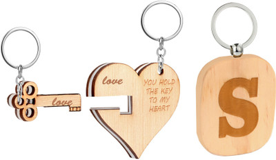 

Flipkart SmartBuy Trending Wooden Finish Combo of Heart & Key Shape key Chain and Alphabet -S Key Chain