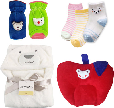 

My New Born Daily Use pack having 1 baby Towel/Wrapper, 2 Feeding Bottle Covers, 1 Mustard Seed Filled Pillow and 3 Pairs of Socks for babies(Multicolor)