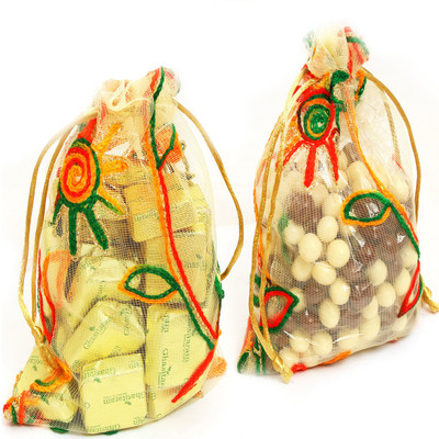 

Ghasitaram Gifts Chocolate and Nutties in Net Pouches Bars(300 g)