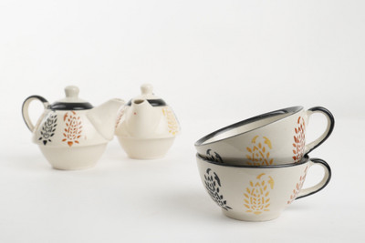 

Caffeine Caffeine Ceramic Handmade Authentic Leaf Pattern 2 in 1 Teapot with Cup (Set of 2) Ceramic(Multicolor, White, Pack of 2)
