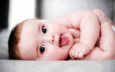 

Adorable Baby showing tongue Poster Paper Print(12 inch X 18 inch, Rolled)
