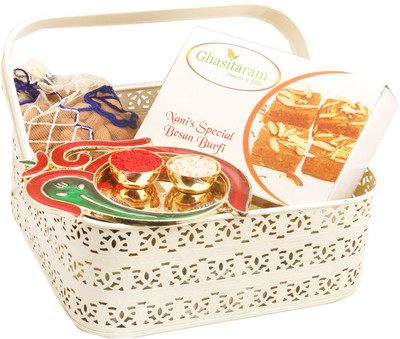

Ghasitaram Gifts Hampers-White Metal Basket with Nani's Spl Besan Barfi, Almonds Pouch and Om Ganesh Pooja Thali Combo(4)