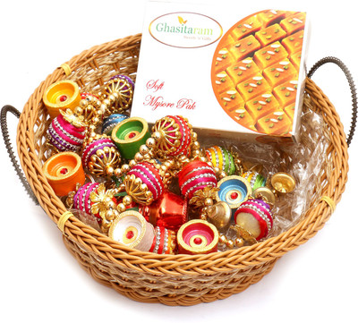 

Ghasitaram Gifts Hampers-Big Cane Basket Basket with Mysore Pak, Toran and Diyas Combo(9)