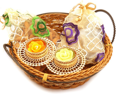 

Ghasitaram Gifts Hampers-Small Cane Basket with Almonds, Roasted Almond Bites Pouches and 2 T-Lites Combo(5)