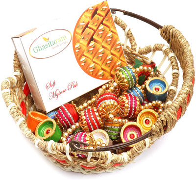 

Ghasitaram Gifts Hampers-Jute Cane Basket with Mysore Pak, Toran and Diyas Combo(9)