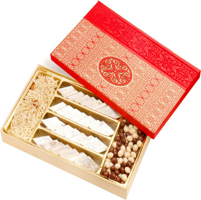 

Ghasitaram Gifts Hampers-Red Satin Hamper box with Kaju katli, Nutties and Namkeen Combo(4)