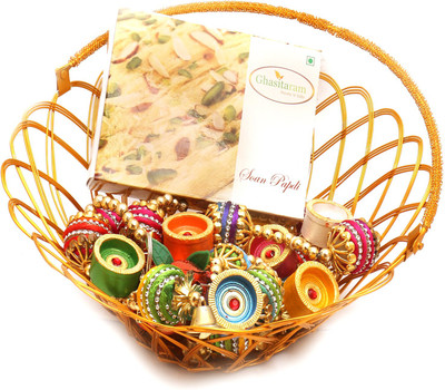 

Ghasitaram Gifts Hampers-Gold Wired Basket with Soan Papdi, Toran and Diyas Combo(9)