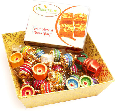 

Ghasitaram Gifts Hampers-Yellow Basket with Nani's Special Besan Barfi, Toran and Diyas Combo(9)
