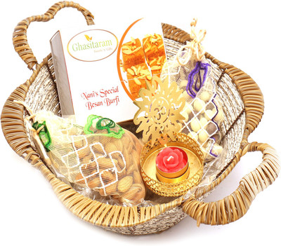 

Ghasitaram Gifts Hampers-Brown Basket with Nani's Spl Besan Barfi, Almonds, Nutties Pouch with Om T- Lite Combo(5)