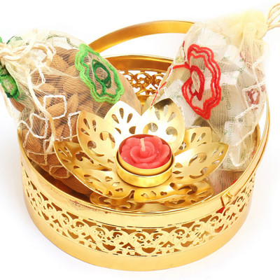 

Ghasitaram Gifts Chocolates-Round Golden Basket with alomnds, Chocolate Pouches and Golden T- Lite Combo(4)