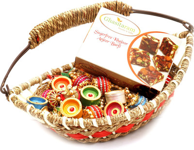 

Ghasitaram Gifts Healthy Hampers-Jute Cane Boat Basket with Sugarfree Mix, Toran and Diyas Combo(9)