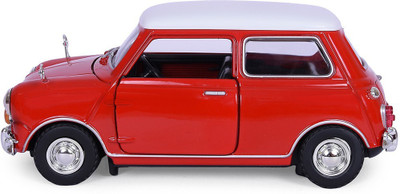 

Motormax 1:18 Morris Mini Cooper 1961-67 Diecast Car Mounted On A Plastic Stand & With The Name Lable(Multicolor)