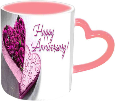 

Raj Laxmi Happy Anniversary With Purple Roses Pink Handle Ceramic Mug(350 ml)