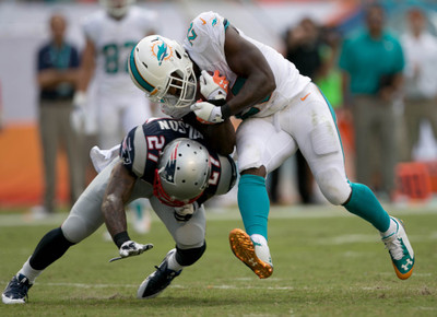 

Sports Miami Dolphins Football HD Wall Poster Paper Print(12 inch X 18 inch, Rolled)