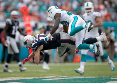 

Sports Miami Dolphins Football Wall Poster Paper Print(12 inch X 18 inch, Rolled)