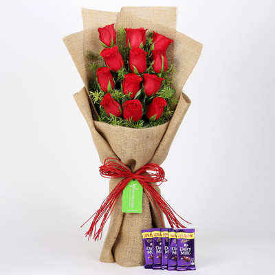 

Ferns N Petals 12 Layered Red Roses & Cadbury Dairy Milk Combo(550gms)