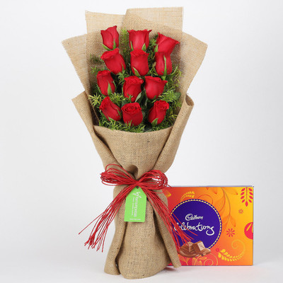 

Ferns N Petals 12 Layered Red Roses & Cadbury Celebrations Combo(550gms)