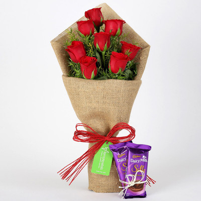

Ferns N Petals 8 Red Roses Bouquet & Dairy Milk Silk Combo(550gms)