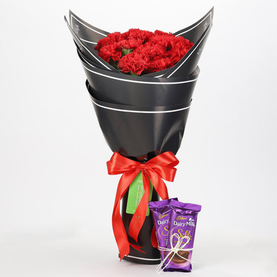 

Ferns N Petals Beautiful 12 Red Carnations & Silk Combo Combo(550gms)