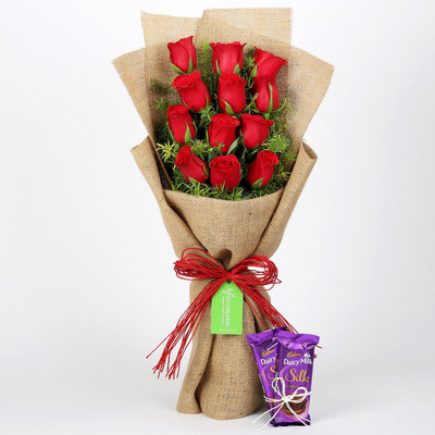 

Ferns N Petals 12 Layered Red Roses Bouquet & Dairy Milk Silk Combo(550gms)