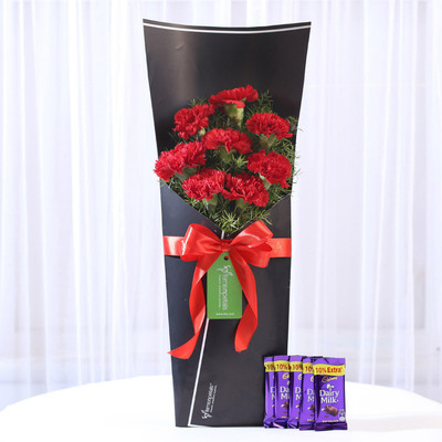 

Ferns N Petals 8 Red Carnations Bouquet & Dairy Milk Combo Combo(550gms)