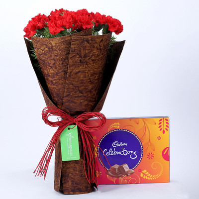 

Ferns N Petals 12 Red Carnations Bouquet & Celebrations Box Combo(550gms)