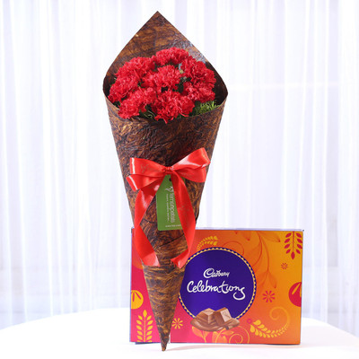

Ferns N Petals 8 Vibrant Red Carnations & Celebrations Box Combo(550gms)