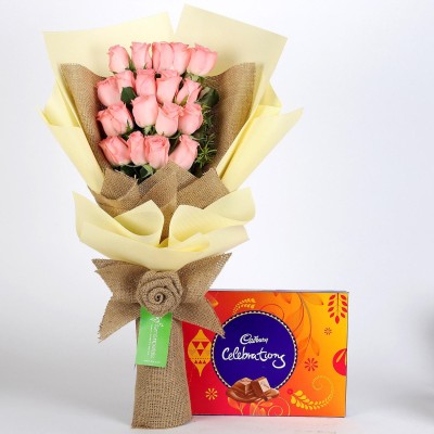 

Ferns N Petals 20 Pink Roses & Cadbury Celebrations Box Combo(550gms)