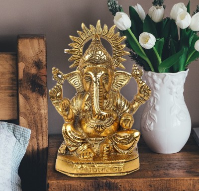 DreamKraft Metal Lord Ganesha Statue Sitting On Chowki Decorative Showpiece  -  22.5 cm(Aluminium, Gold)