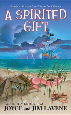 A Spirited Gift(English, Electronic book text, Lavene Joyce, Jim)