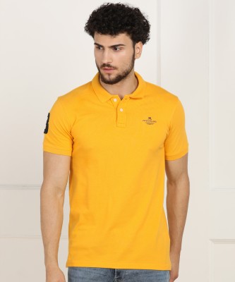 Peter England Solid Men Polo Neck Yellow T-Shirt