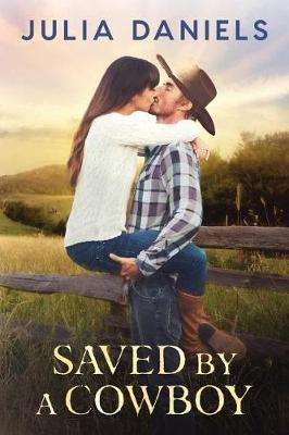 Saved by a Cowboy(English, Paperback, Daniels J)