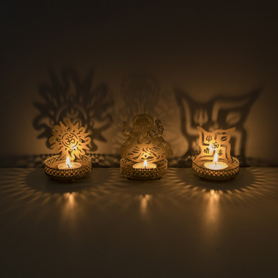 Flipkart SmartBuy Set of 3 Shadow Ganesh Sathiya Iron 3 - Cup Tealight Holder Set(Gold, Pack of 3)