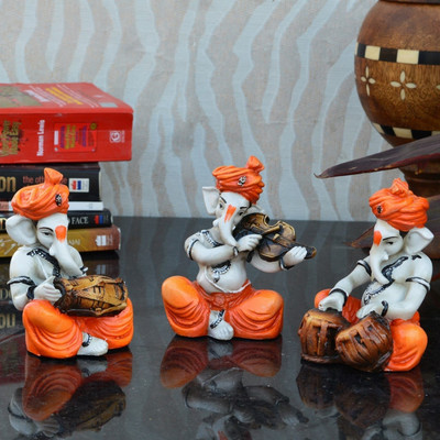 eCraftIndia Set Of 3 Ganesha Playing Musical Instruments Decorative Showpiece  -  12.7 cm(Polyresin, Orange, Brown)