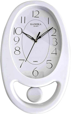 Radhika Analog 39 cm X 24 cm Wall Clock(White, With Glass, Pendulum)