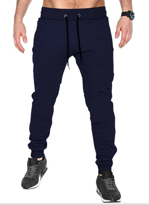 KICKER Solid Men Blue Track Pants
