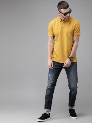 Roadster Solid Men Polo Neck Yellow T-Shirt
