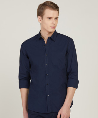 36 OFF on Flying Machine Men Solid Casual Light Blue Shirt on