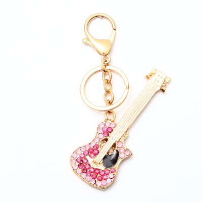 

Lotus E GOLDEN & CRYSTALS METALLIC PINK GUITAR Key Chain